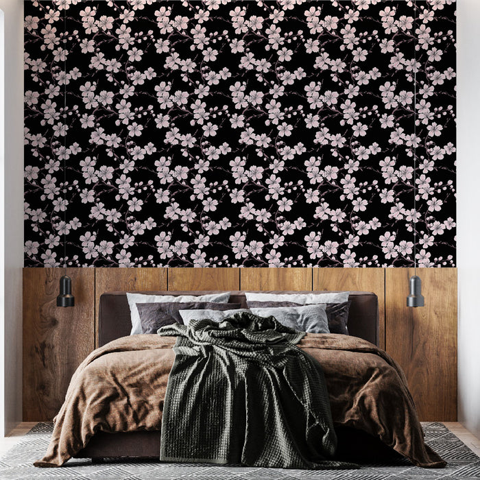 Une chambre moderne avec un papier peint floral sur fond noir, orné de délicates fleurs roses, évoquant une ambiance élégante et apaisante.