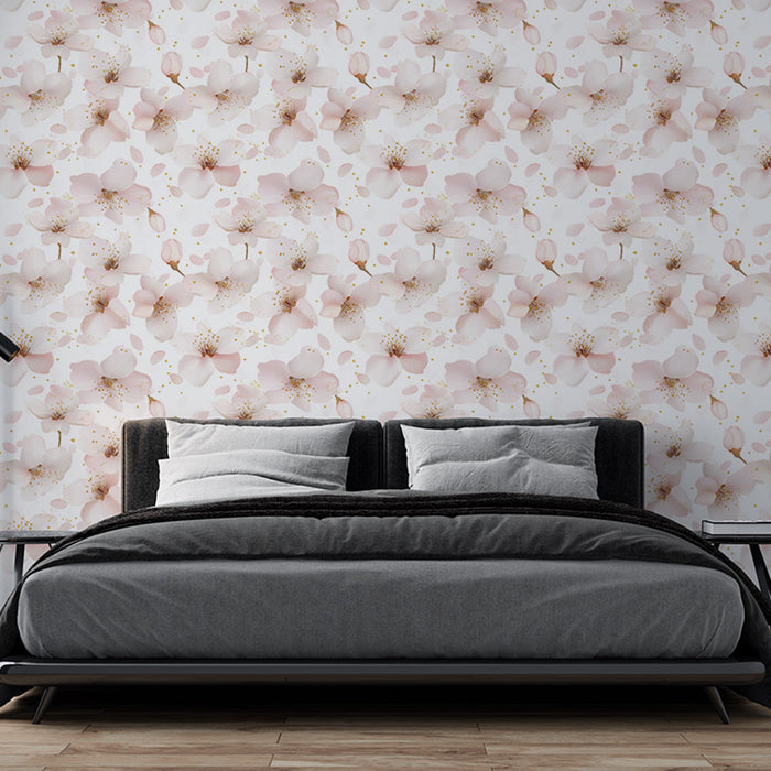 Une chambre moderne avec un papier peint floral aux nuances douces de rose et blanc, créant une atmosphère délicate et apaisante.