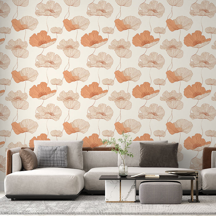 Un salon élégant avec un papier peint floral aux teintes terracotta et beige, évoquant une ambiance chaleureuse et naturelle.