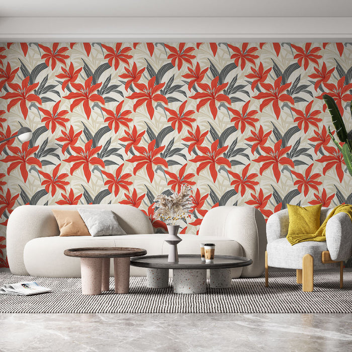 Un salon moderne avec un papier peint floral aux motifs de grandes fleurs rouges et feuilles grises sur fond clair, créant une ambiance vivante et chaleureuse.