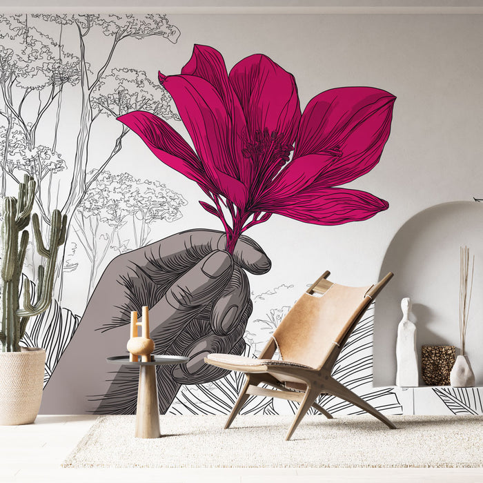 Une pièce moderne avec un papier peint artistique représentant une main tenant une fleur rose vif sur fond monochrome, créant une atmosphère dynamique et contemporaine.