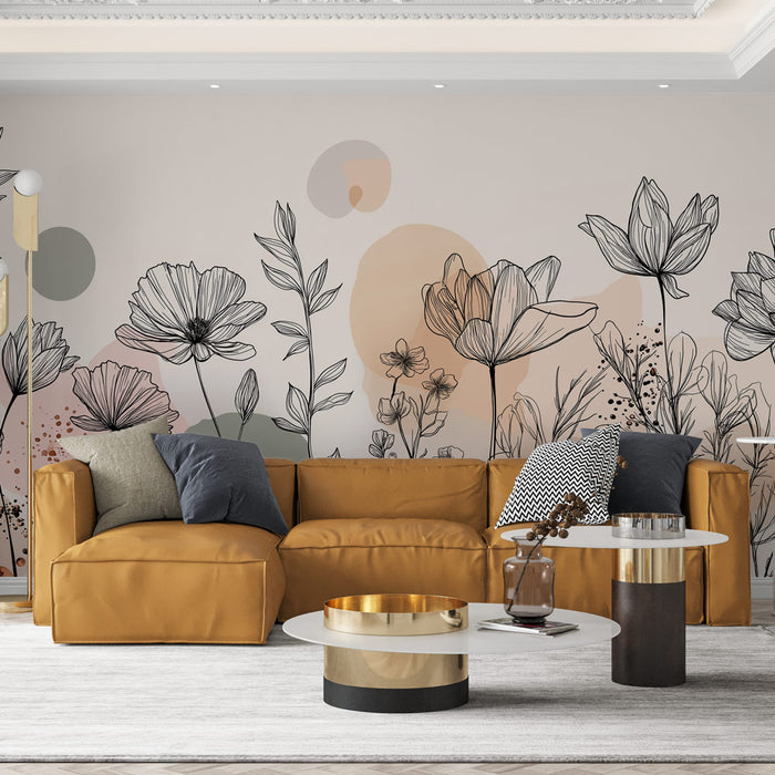 Un salon moderne avec un papier peint floral en noir et blanc sur fond doux, évoquant une atmosphère apaisante et artistique.