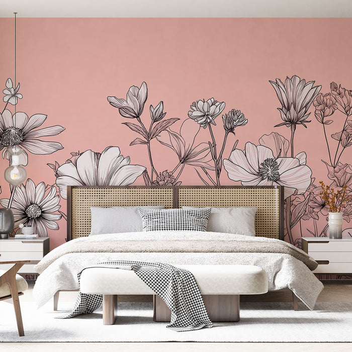Une chambre élégante avec un papier peint floral noir et blanc sur fond rose, créant une atmosphère douce et romantique.