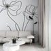 Papier peint minimaliste avec silhouettes de fleurs élégantes en lignes noires sur fond blanc pour salon moderne