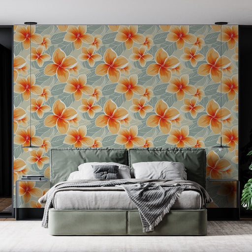 Une chambre moderne avec un papier peint floral aux grandes fleurs orange et jaunes sur fond vert, créant une ambiance chaleureuse et accueillante.