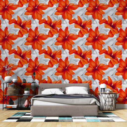 Une chambre moderne avec un papier peint floral aux grandes fleurs orange sur fond gris, créant une ambiance dynamique et chaleureuse.
