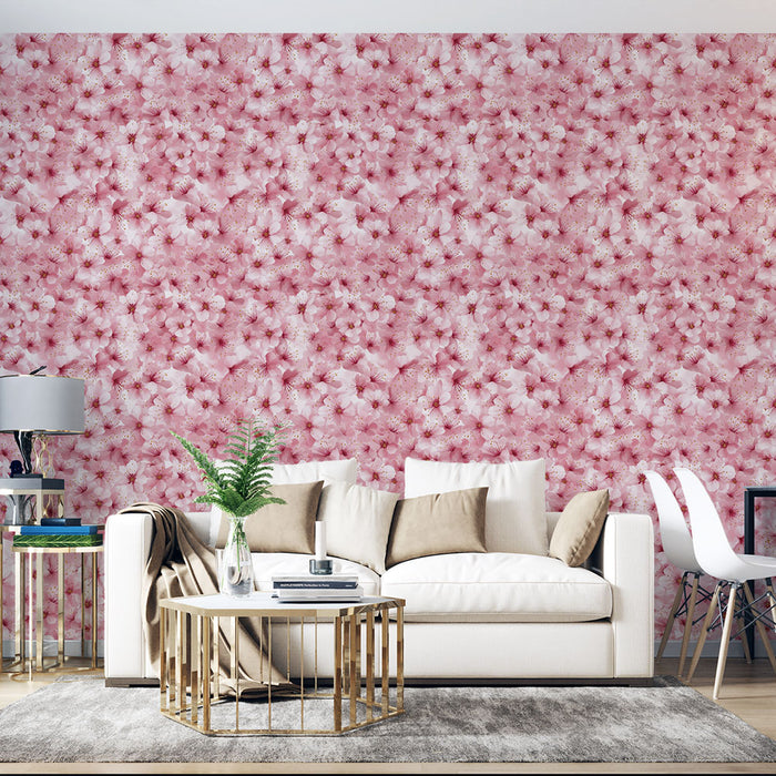 Un salon moderne avec un papier peint floral aux nuances de rose, représentant des fleurs délicates qui créent une ambiance douce et romantique.