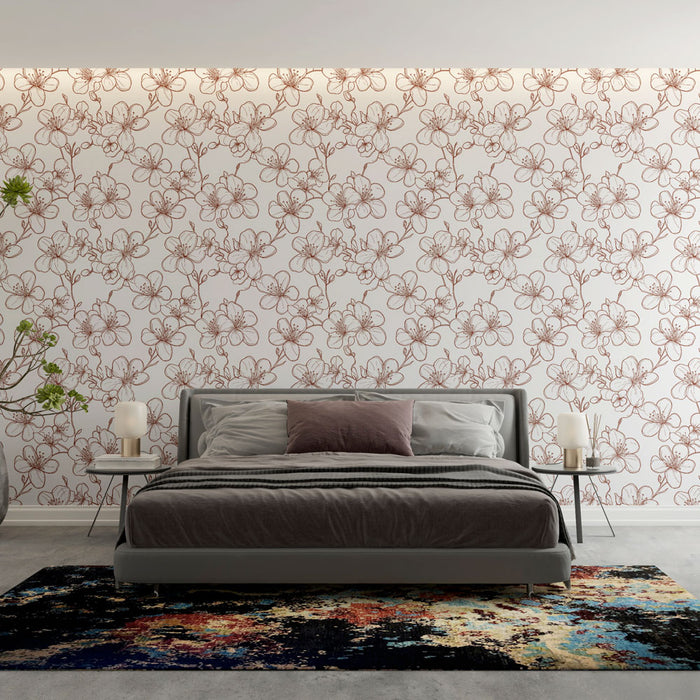 Une chambre moderne avec un papier peint floral aux motifs délicats en rouge sur fond blanc, apportant une atmosphère douce et élégante.