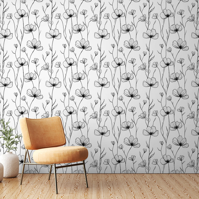 Une chambre moderne avec un papier peint floral noir et blanc aux motifs délicats, créant une ambiance élégante et apaisante.