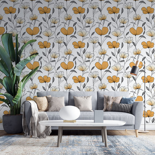 Un salon moderne avec un papier peint floral aux motifs de fleurs jaunes et blanches sur fond clair, créant une ambiance chaleureuse et accueillante.