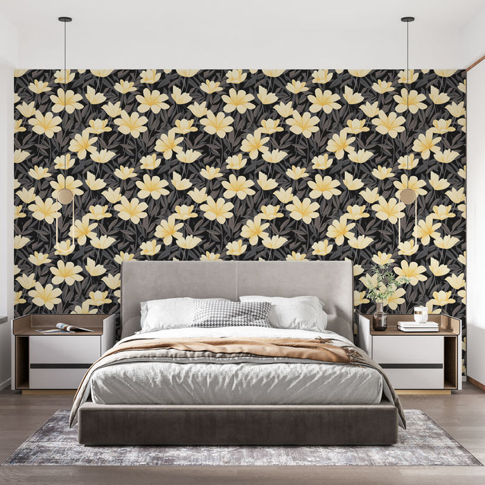 Une chambre moderne avec un papier peint floral jaune sur fond noir, créant une ambiance élégante et chaleureuse.