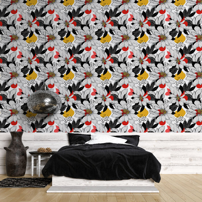 Une chambre moderne avec un papier peint floral aux motifs vibrants de fleurs blanches, rouges et jaunes sur fond noir, créant une ambiance dynamique et chaleureuse.