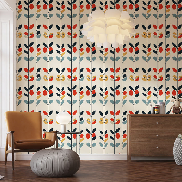 Une pièce moderne avec un papier peint floral aux motifs stylisés de feuilles et baies rouges, bleues et jaunes sur fond clair, créant une ambiance joyeuse et dynamique.