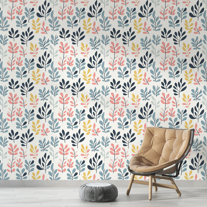 Une pièce moderne avec un papier peint floral aux motifs colorés de feuilles dans des teintes douces de rose, bleu et jaune sur fond clair.