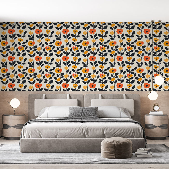 Une chambre moderne avec un papier peint floral aux motifs colorés de fleurs rouges et jaunes sur fond clair, créant une ambiance joyeuse et chaleureuse.