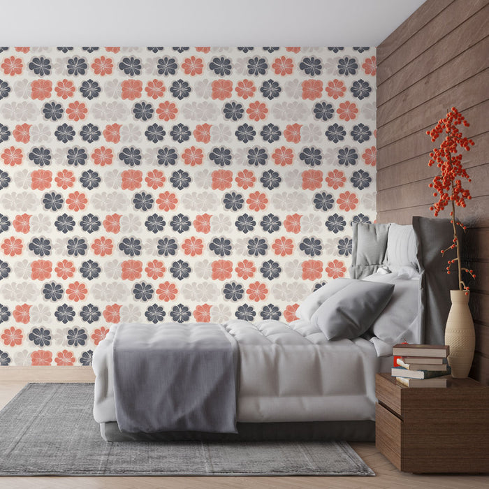 Une chambre moderne avec un papier peint floral aux motifs colorés de fleurs rouges, noires et grises sur fond clair, créant une ambiance chaleureuse et accueillante.
