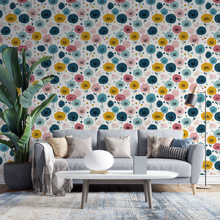 Un salon moderne avec un papier peint coloré représentant des arbres stylisés aux teintes vives de rose, jaune et bleu sur fond clair, créant une atmosphère joyeuse et dynamique.