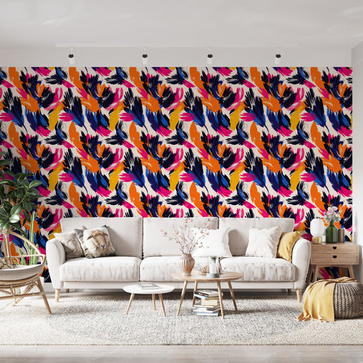 Un salon moderne avec un papier peint vibrant aux motifs floraux colorés, mêlant des teintes de rose, orange, bleu et noir, créant une atmosphère joyeuse et dynamique.