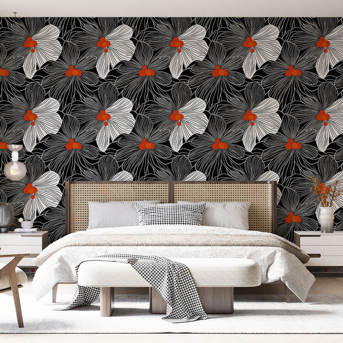 Une chambre moderne avec un papier peint floral noir et blanc, agrémenté de touches rouges, créant une ambiance à la fois élégante et dynamique.