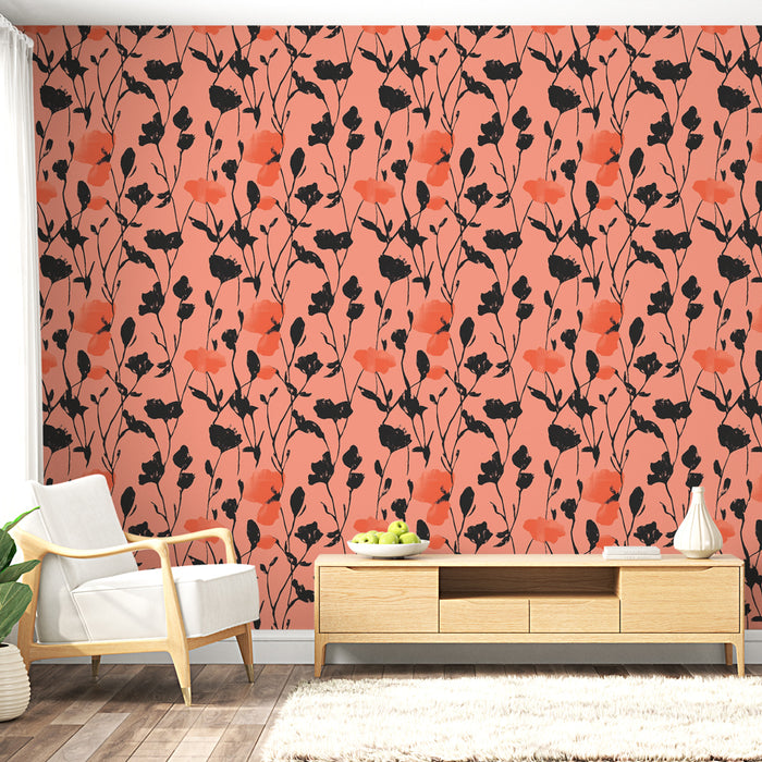Un salon lumineux avec un papier peint floral aux teintes corail et noires, créant une ambiance chaleureuse et accueillante.