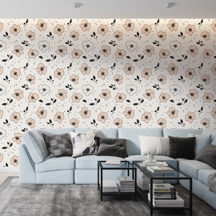 Un salon moderne avec un papier peint floral aux motifs de fleurs roses et noires sur fond clair, créant une ambiance douce et accueillante.