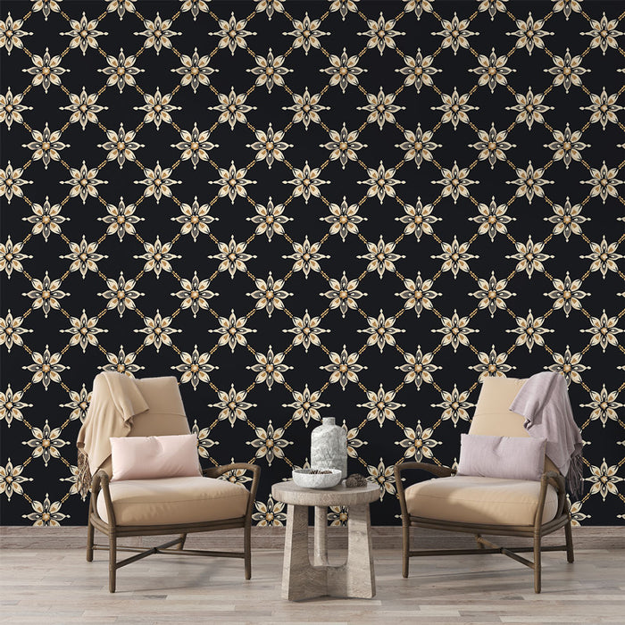 Un salon élégant avec un papier peint floral noir et doré aux motifs raffinés, créant une atmosphère chaleureuse et sophistiquée.