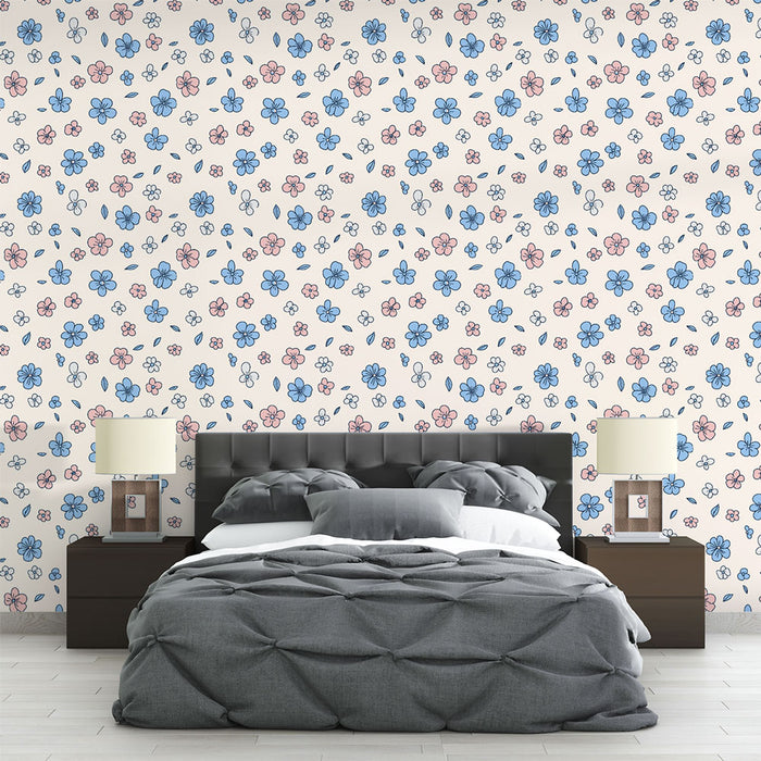 Une chambre moderne avec un papier peint floral aux motifs colorés de fleurs bleues et roses sur fond clair, créant une atmosphère douce et accueillante.