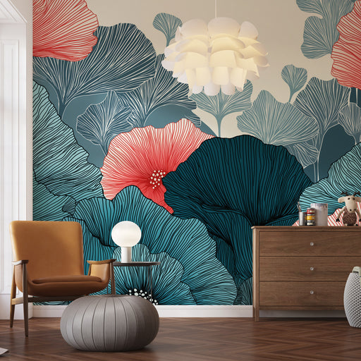 Une chambre moderne avec un papier peint floral aux grandes feuilles stylisées en bleu et rouge, créant une ambiance artistique et vivante.