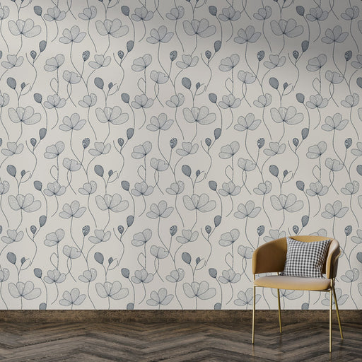 Une pièce moderne avec un papier peint floral aux motifs délicats en bleu sur fond clair, créant une atmosphère douce et apaisante.