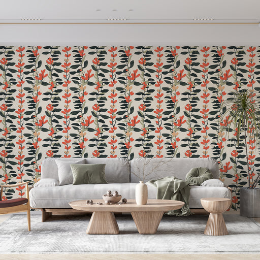 Un salon moderne avec un papier peint floral crème, orné de motifs de feuilles vertes et de fleurs rouges, créant une ambiance chaleureuse et accueillante.