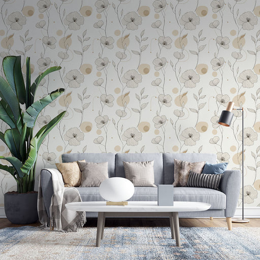 Un salon moderne avec un papier peint floral aux motifs délicats de fleurs noires et touches beige sur fond clair, créant une ambiance douce et apaisante.