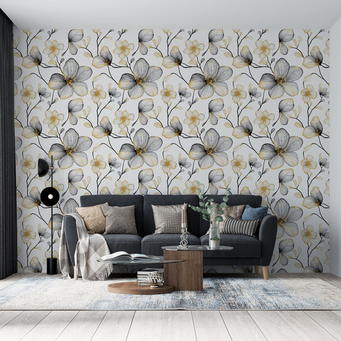 Un salon moderne avec un papier peint floral noir et jaune représentant de grandes fleurs sur fond clair, créant une ambiance fraîche et accueillante.