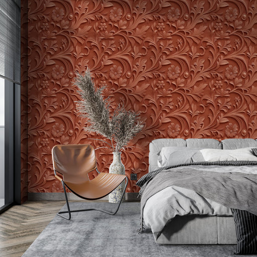Une chambre moderne avec un papier peint texturé rouge terracotta aux motifs floraux élégants, créant une atmosphère chaleureuse et accueillante.