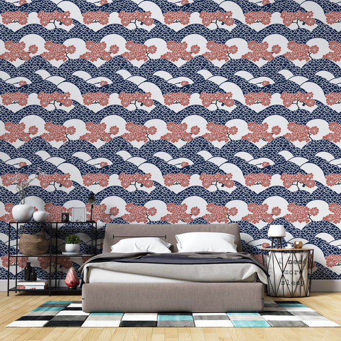 Une chambre moderne avec un papier peint évoquant des vagues bleues et des fleurs corail sur fond blanc, créant une atmosphère apaisante et élégante.