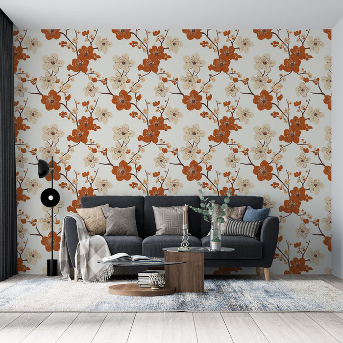 Un salon moderne avec un papier peint floral aux motifs de fleurs orange et crème sur fond clair, créant une atmosphère chaleureuse et accueillante.