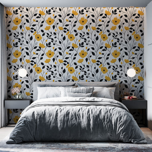 Une chambre moderne avec un papier peint floral aux motifs jaunes et noirs sur fond blanc, créant une ambiance lumineuse et joyeuse.