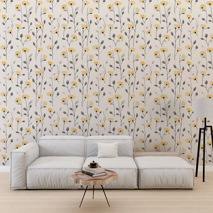 Un salon moderne avec un papier peint floral aux motifs de fleurs jaunes et grises sur fond clair, créant une ambiance fraîche et accueillante.