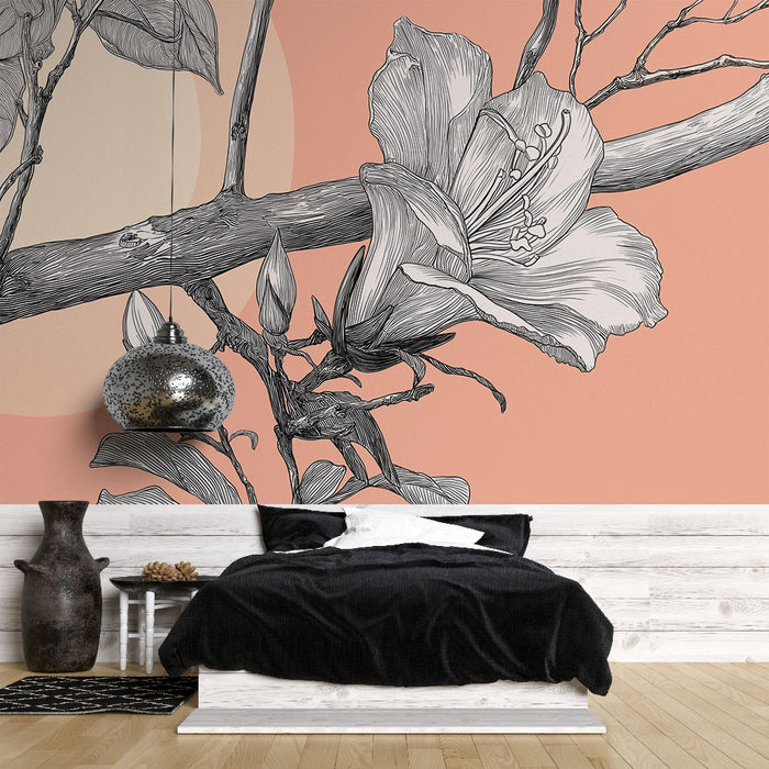Une chambre moderne avec un papier peint illustrant des fleurs et des branches en noir sur fond rose, créant une ambiance artistique et délicate.