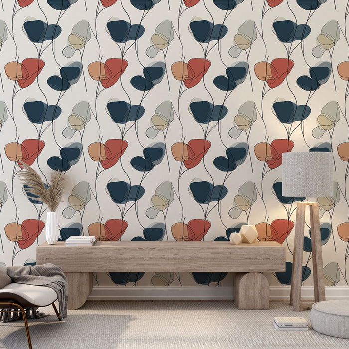 Une pièce lumineuse avec un papier peint floral aux motifs stylisés de fleurs dans des teintes chaudes et froides, créant une ambiance moderne et accueillante.