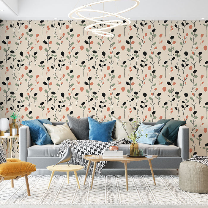 Un salon lumineux avec un papier peint à motifs floraux délicats sur fond beige, mêlant des teintes de vert, noir et terracotta pour une ambiance chaleureuse et moderne.
