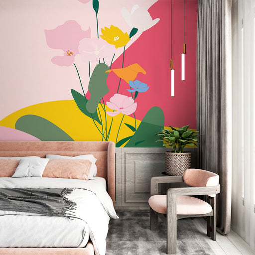 Une chambre lumineuse avec un papier peint floral aux teintes vives de rose, jaune et vert, créant une ambiance joyeuse et moderne.