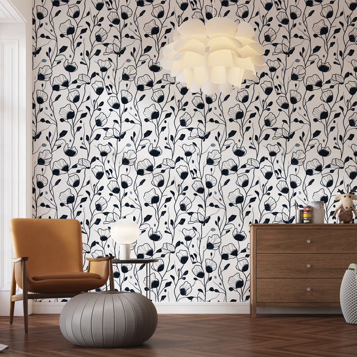 Une pièce moderne avec un papier peint floral noir et blanc aux motifs délicats, créant une ambiance élégante et apaisante.