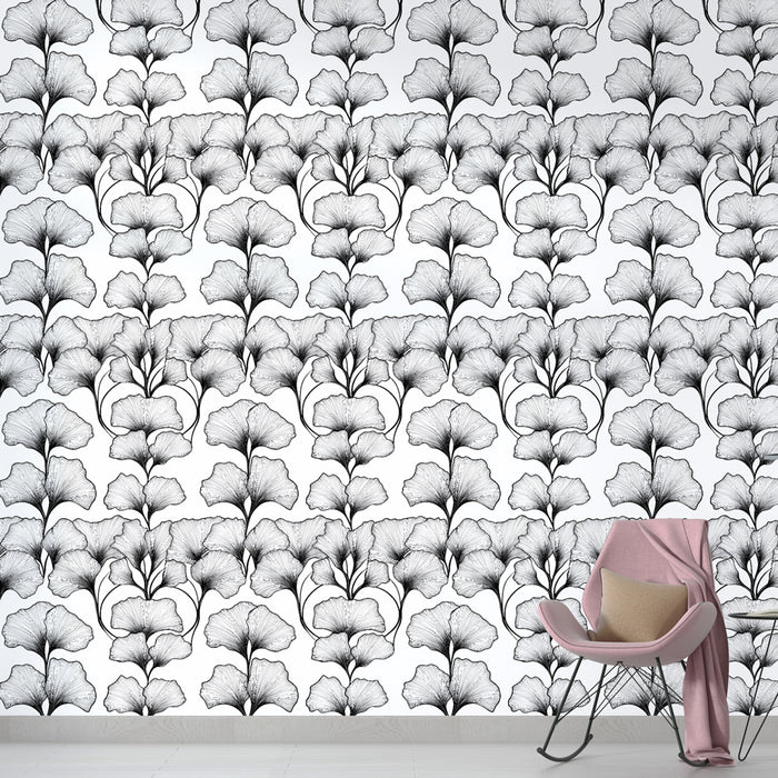 Une chambre moderne avec un papier peint floral noir et blanc représentant des motifs délicats de fleurs, créant une ambiance élégante et apaisante.