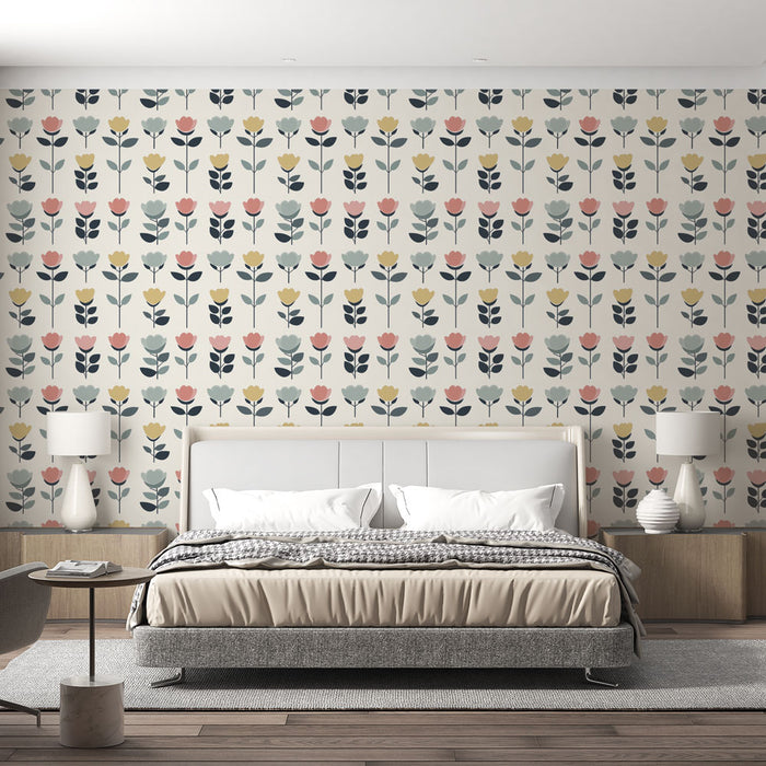 Une chambre moderne avec un papier peint floral aux motifs colorés de fleurs et de feuilles sur fond clair, créant une atmosphère chaleureuse et accueillante.