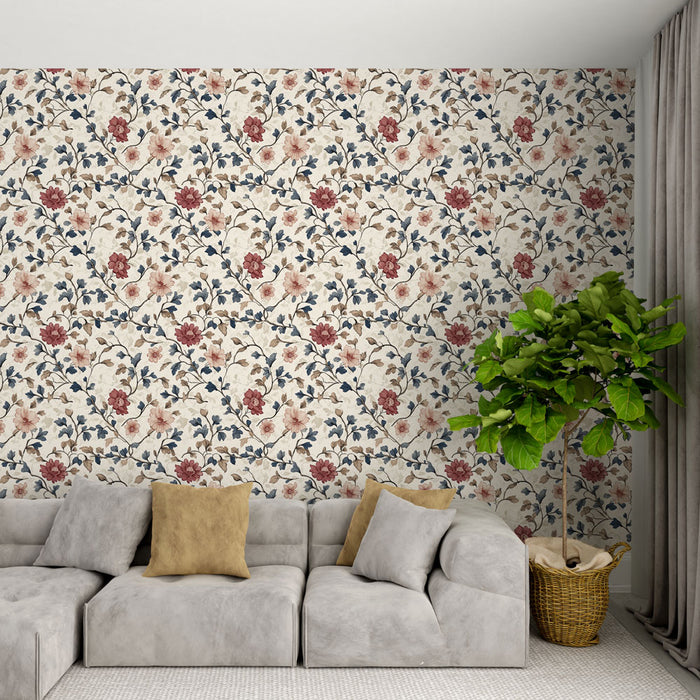 Un salon moderne avec un papier peint floral aux teintes douces de beige, rouge et bleu, créant une ambiance chaleureuse et accueillante.