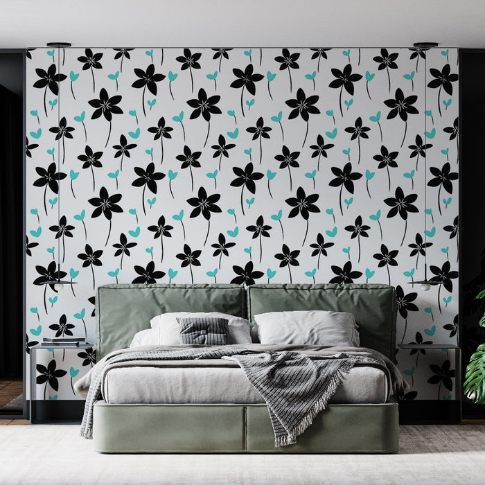 Une chambre moderne avec un papier peint floral noir et turquoise sur fond blanc, créant une ambiance fraîche et dynamique.