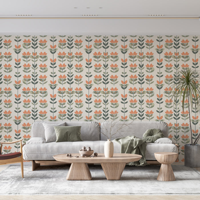 Un salon lumineux avec un papier peint floral aux motifs de fleurs orange et vertes sur fond clair, créant une ambiance chaleureuse et accueillante.