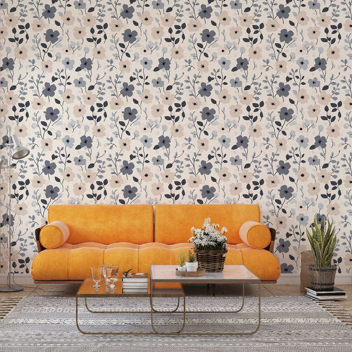 Un salon moderne avec un papier peint floral aux teintes douces de rose, bleu et noir, créant une atmosphère chaleureuse et accueillante.