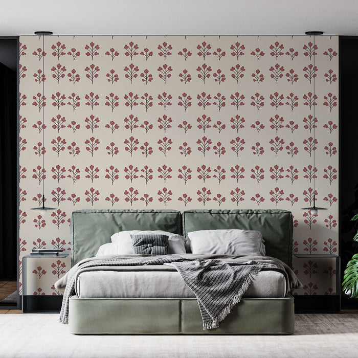 Une chambre moderne avec un papier peint floral beige orné de motifs rouges délicats, créant une atmosphère chaleureuse et accueillante.
