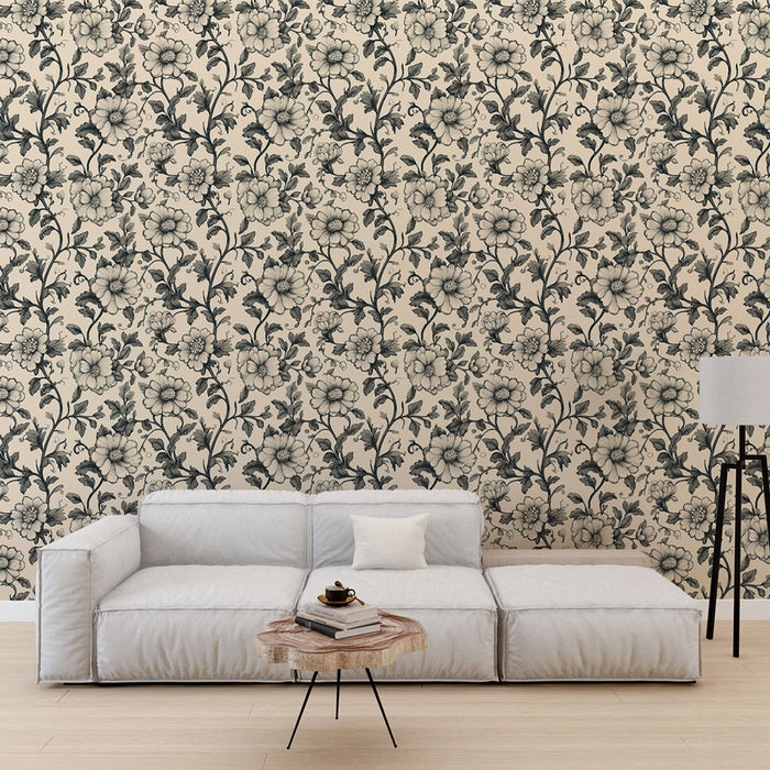 Un salon moderne avec un papier peint floral beige et noir aux motifs élégants, créant une ambiance chaleureuse et raffinée.